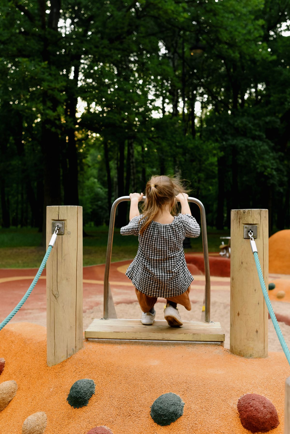 Outdoor play area of Little Lotus preschool with slides and play equipment